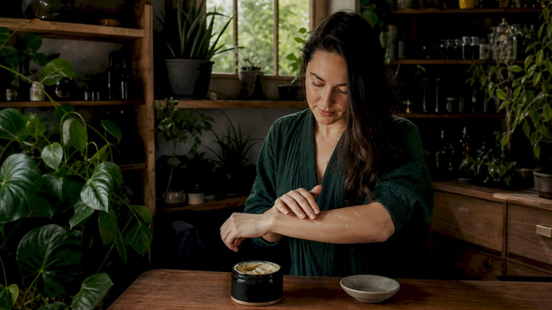 Woman applying animal-based skincare balm